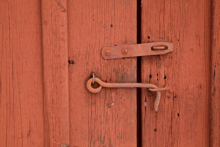 detail of a red wooden shed suitable as background textureの写真素材