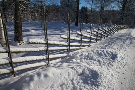 Typical swedish fence in the winter timeの写真素材