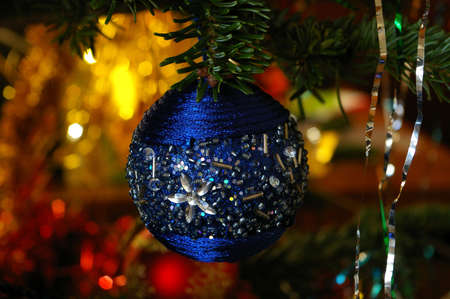 Christmas ball at the fir tree branchの写真素材