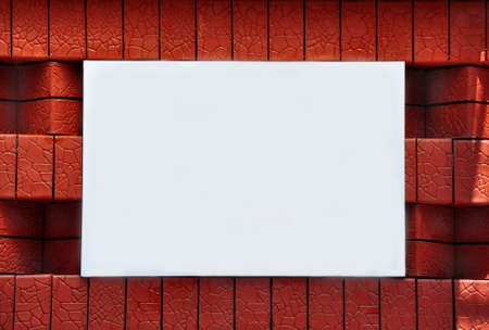Blank sign with space for text on a new brick wallの写真素材