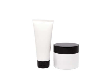 Cosmetic black & white bottles for cream isolated on white backgroundの写真素材