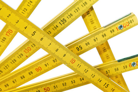 Yellow collapsible ruler of the carpenter