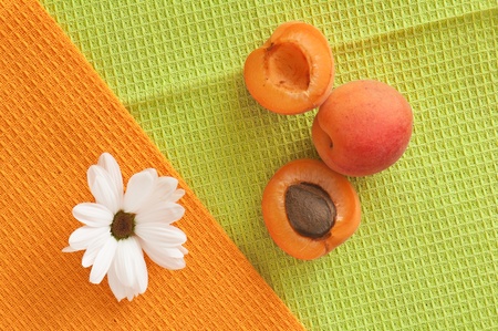 The ripe apricot lays on towelsの写真素材