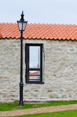 Window aperture in a wall from calcareous stones, a close upの写真素材