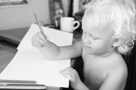 Black and white portrait of a small drawing of the child  の写真素材