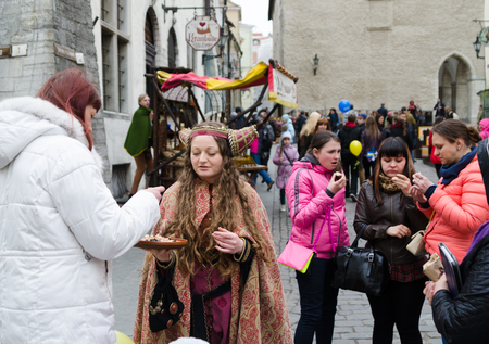 TALLINN,ESTONIA - MAY 1: Tallinn Old town on MAY 1,2014. Tourists walk through the ancient streets of Tallinn. It's Old Town is listed as a UNESCO World Heritage Sites.のeditorial素材