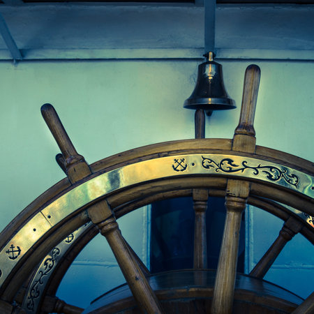 Steering wheel of an old sailing vessel, close upの写真素材