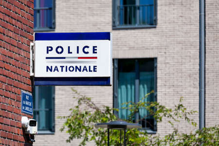 Standard sign of the Police Nationale outside of a police station in the city center of Amiens.のeditorial素材