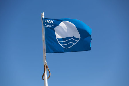 Saint-Gilles les Bains, La RÃ©union - June 25 2017: The Blue Flag indicate that a beach, marina or sustainable boating tourism operator meets its stringent standards.のeditorial素材