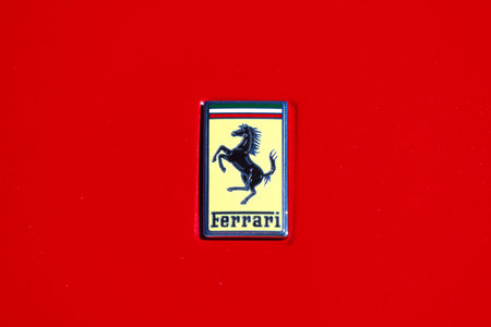 Chantilly, France - October 30 2016: The famous prancing horse Ferrari emblem located on front of...