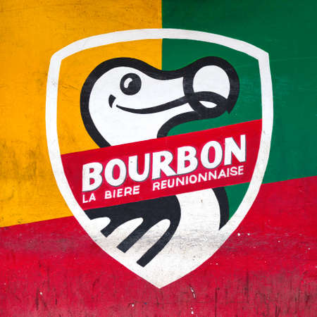 Saint-Denis, RÃ©union - December 09 2014: Wall of a house painted with the colors of the local beer brewery Bourbon using the instinct Dodo bird symbol.のeditorial素材