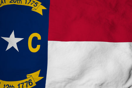 Full frame close-up on a waving flag of North Carolina (USA) in 3D rendering.の写真素材