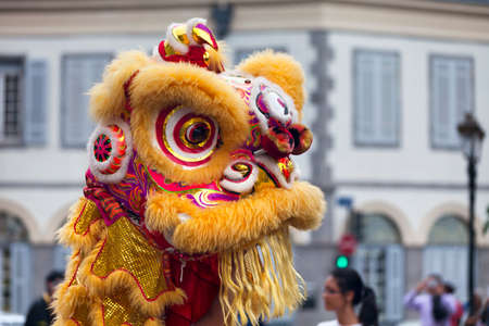 Saint Denis, Reunion Island - August 07 2015: Performers wearing the traditional lion costume and dancing during the Guan Di Festival.のeditorial素材