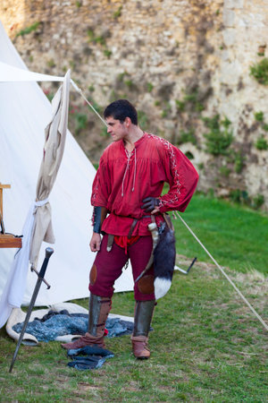 Bazoges-en-Pareds, France - July 29 2017: Archer near his tent during the annual Nocturnes Medievale...