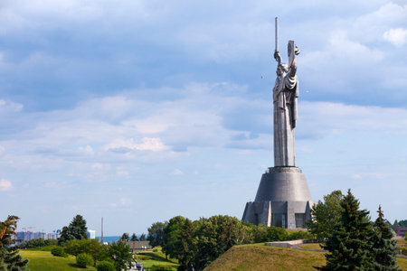 Kiev, Ukraine - July 04 2018: The Motherland Monument is a 62 m (203 ft) tall monumental statue. Its overall structure measuring 102 m (335 ft) including its base and weighing 560 tons.のeditorial素材