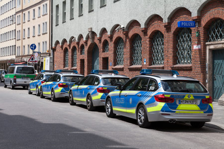 Munich, Germany - May 30 2019: Row of Police cars parked outside of a police station in the city...
