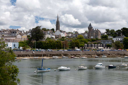 Douarnenez, France - August 29 2021: Aerial view of the Church of the Sacred Heart overlooking the boats moored in the Port-Rhu.のeditorial素材