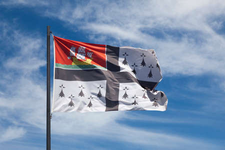 Flag of the city of Nantes waving un mid air.の写真素材