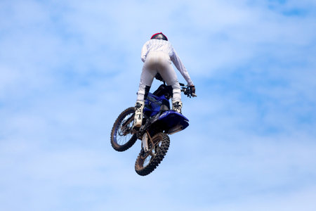 Pleyber-Christ, France - August, 28 2022: Biker doing a freestyle trick with his dirt bike.のeditorial素材