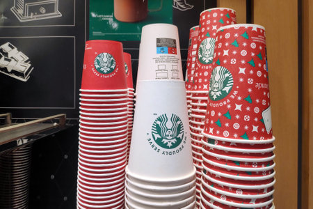 Avranches, France - January 25 2023: Stack of Starbucks cardboard coffee cups at a motorway service station coffee stand.のeditorial素材