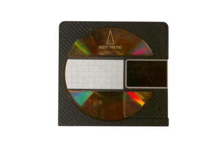 Studio shot of a vintage Mini Disc from the nineties isolated on a white background.の写真素材