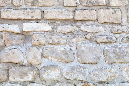 Full frame close-up on a white limestone wall.の写真素材