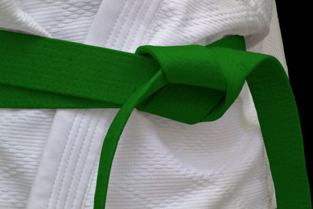 Close-up on a green belt tied around a kimono.の写真素材
