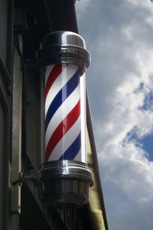 Close-up on an old Barber's pole.の写真素材