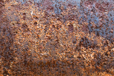Full frame close-up on a rusty iron plate.