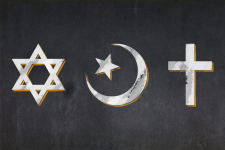 Blackboard with the symbols of the three Abrahamic religions: the Jewish Star of David, the...