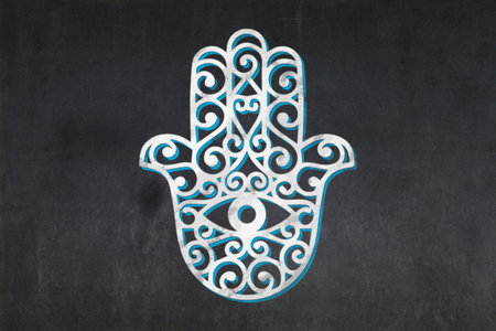 Blackboard with the Hamsa symbol drawn in the middle.の写真素材