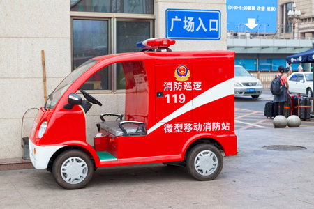 Beijing, China - August 07 2018: Small fire engine parked outside of Beijing Railway Station.