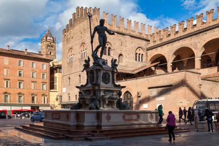Bologna, Italy - April 05 2019: The Fountain of Neptune (Italian: Fontana di Nettuno) is a monumental civic fountain located in the eponymous square, Piazza del Nettuno, next to Piazza Maggiore.のeditorial素材