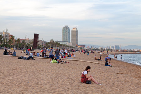 Barcelona, Spain - June 08 2018: People at the beach near the marina.のeditorial素材