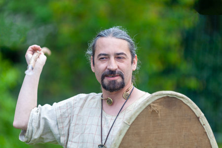 Carhaix, France -  May 01 2023: Warrior with his javelin reenacting a battle between Gaulish tribes.のeditorial素材