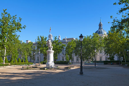 Madrid, Spain - June 06 2018: Gardens of the Plaza Villa de Paris with the statue of Fernando VII (one of the two founder of the Convent and Church of San Francisco de Sales), opposite the Supreme Court.のeditorial素材