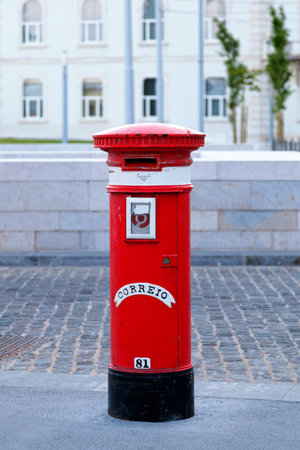 Lisbon, Portugal - June 01 2018: Traditional red Portuguese public mailbox (Correio) based on the same model as its British counterpart.のeditorial素材