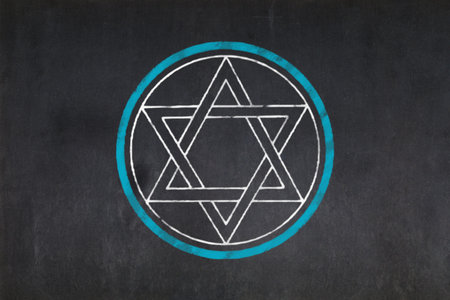 Blackboard with the Star of David symbol in a circle from the Judaism drawn in the middle.の写真素材