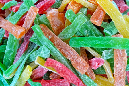 Close-up stack of pÃ¢te de fruits (fruit paste) on a market stall.の写真素材