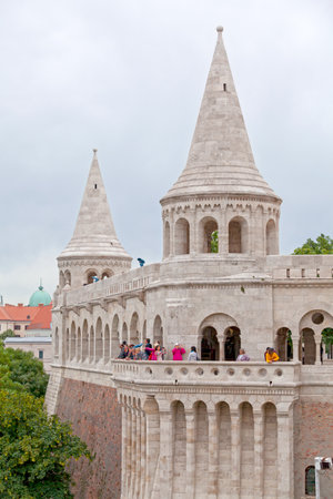 Budapest, Hungary - June 22 2018: The HalÃ¡szbÃ¡stya or Fisherman's Bastion is a terrace in neo-Gothic and neo-Romanesque style situated on the Buda bank of the Danube, on the Castle hill in Budapest, around Matthias Church.のeditorial素材