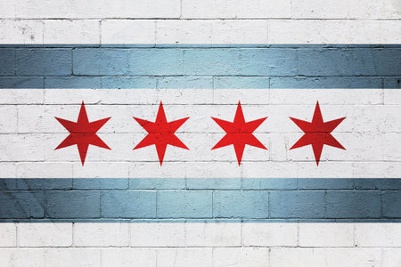 Flag of the city of Chicago painted on a cinder block wall.の写真素材