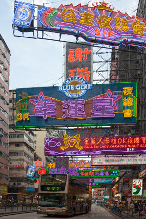 Hong Kong, China - August 19 2007: Nathan Road is one of the busiest streets in the Kowloon peninsula. The street has many neon lights which are already on one hour before dark.のeditorial素材