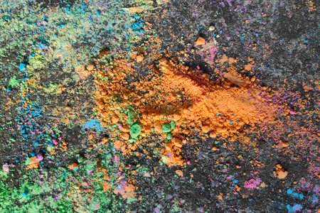 Colored chalk powder on the bitumen.の写真素材