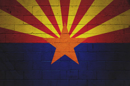 Flag of Arizona painted on a cinder block wall.の写真素材