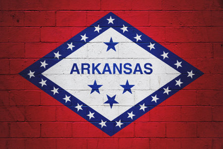 Flag of Arkansas painted on a cinder block wall.の写真素材