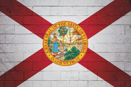 Flag of Florida painted on a cinder block wall.の写真素材