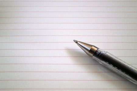 Pen on the top of a paper sheet.の写真素材