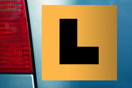 Close-up at an L Plate at the back of a car for learner driver in Australia.の写真素材