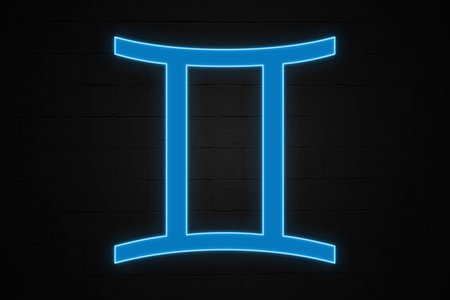 Neon light shaped into the zodiac sign Gemini.の写真素材