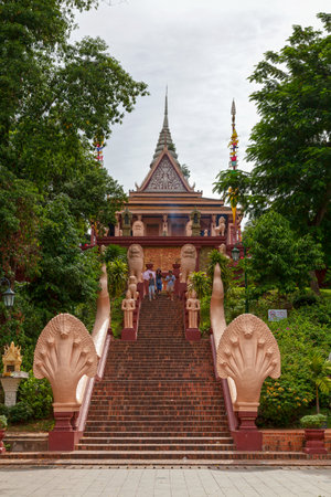 Phnom Penh, Cambodia - August 26 2018: Wat Phnom is a Buddhist temple (wat) built in 1372, and stands 27 metres (88.5 ft) above the ground. It is the tallest religious structure in the city.のeditorial素材